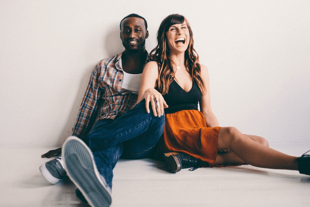 multiracial couple, floor sitting