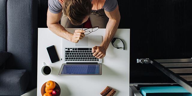 Overhead of freelancer at laptop