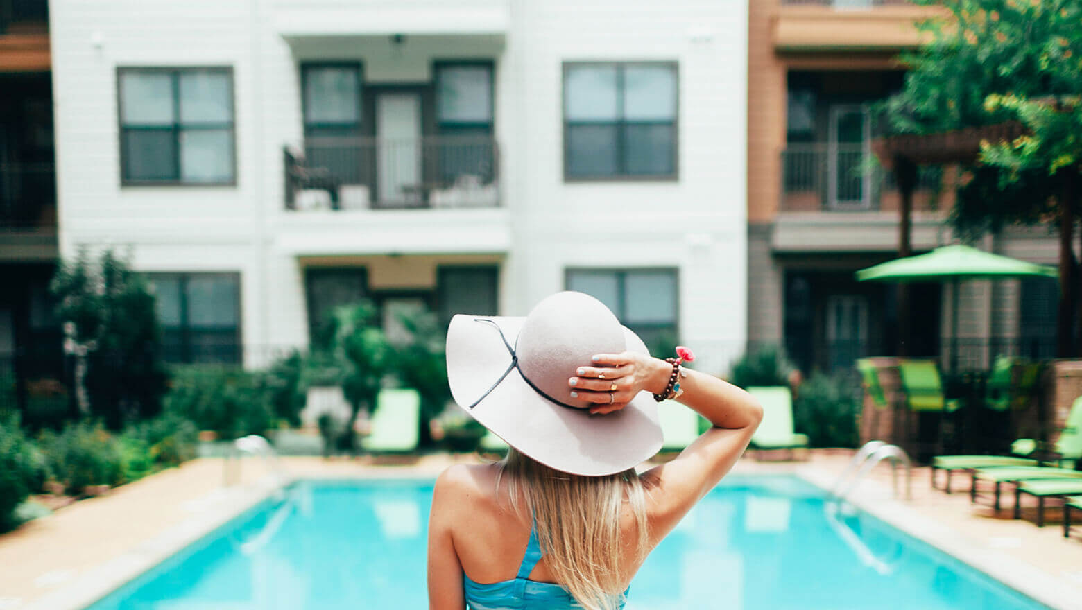 woman on vacation at the pool