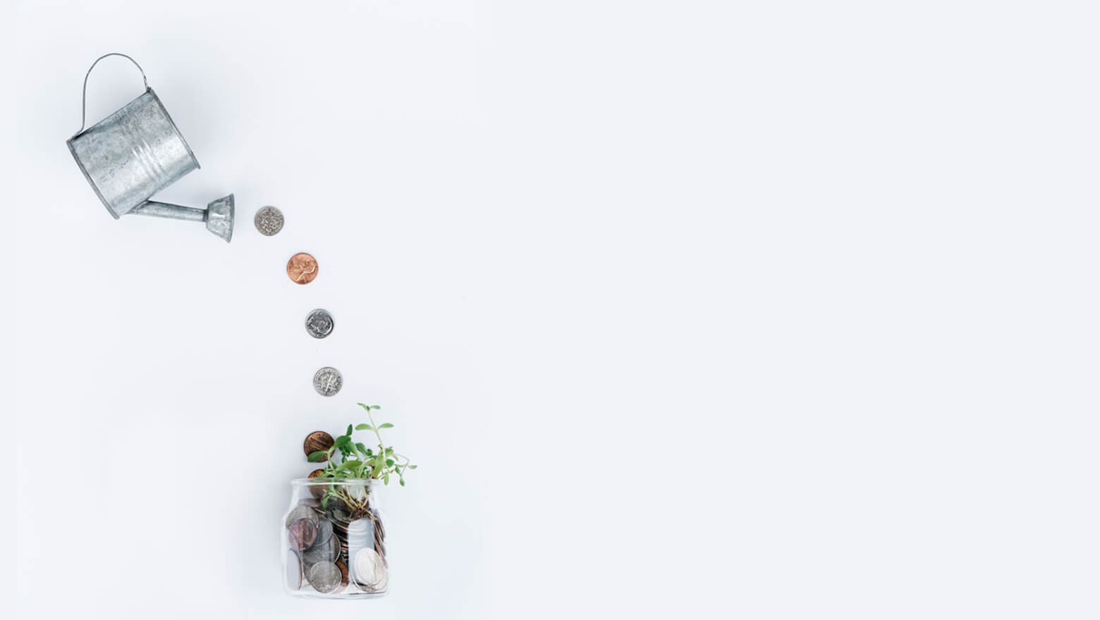 pouring coins into a jar