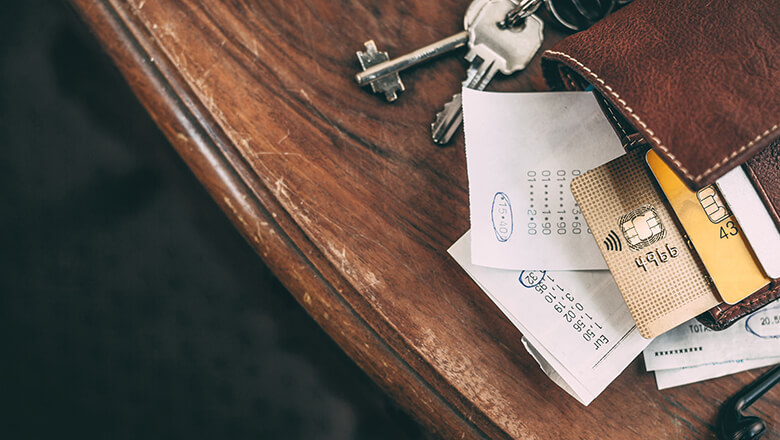 Wallet and keys on table