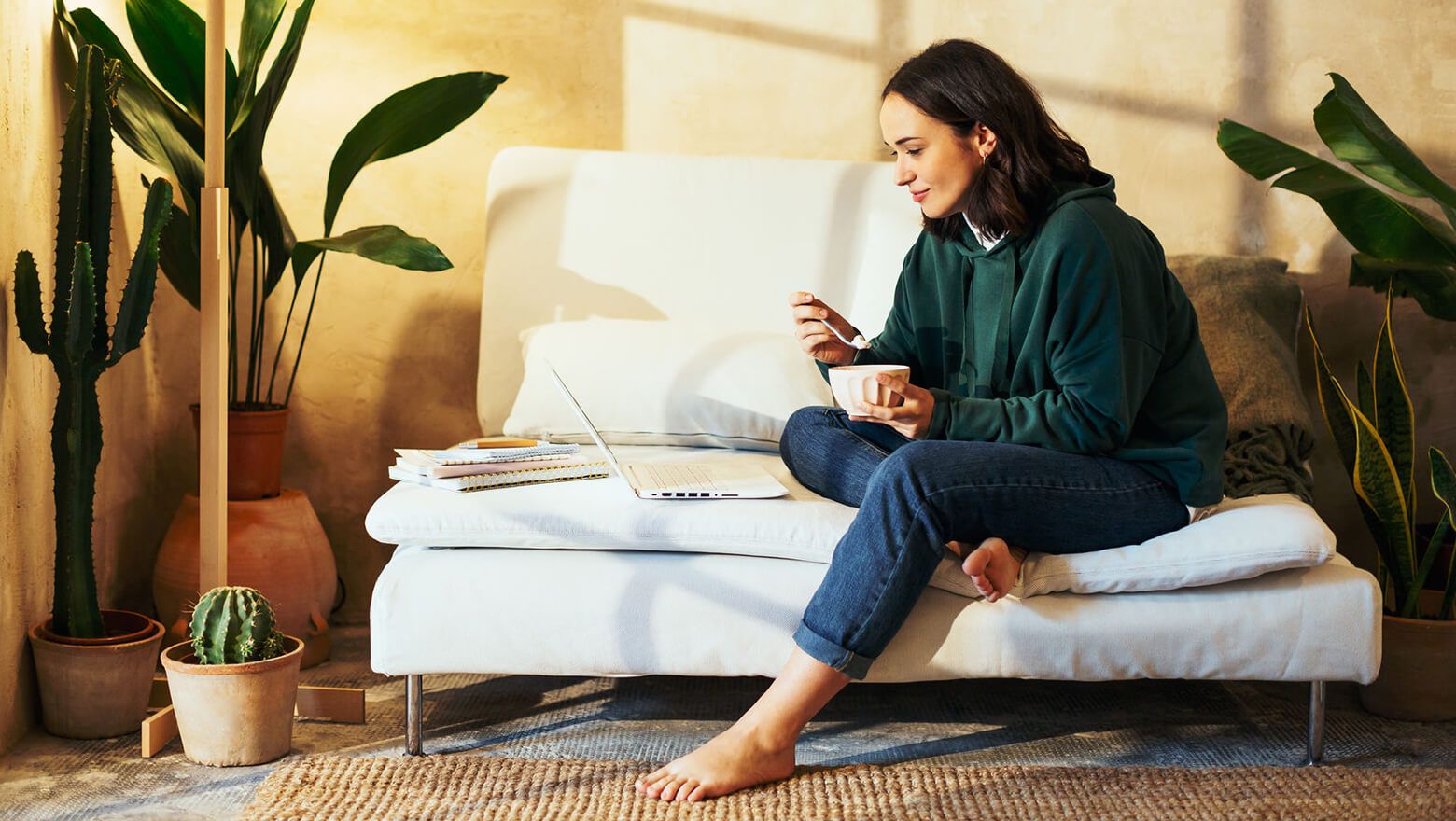 Young woman on couch at home