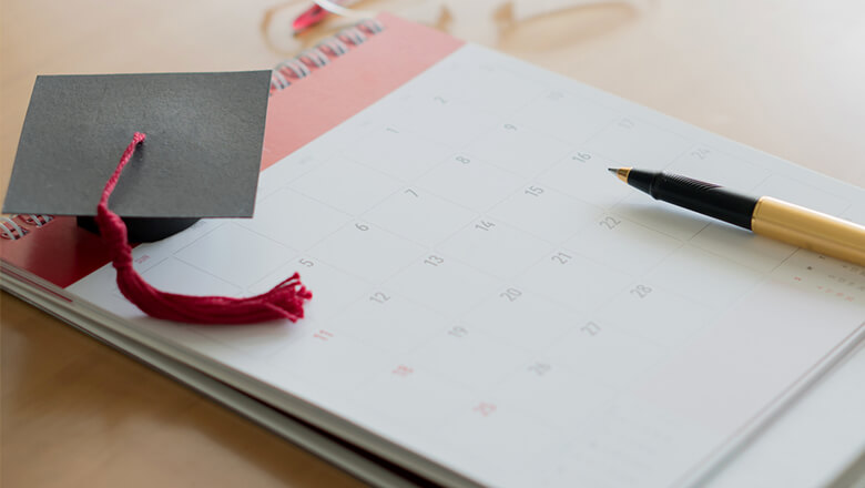 graduation cap and calendar