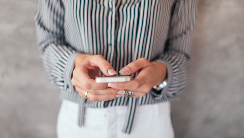 woman holding smartphone