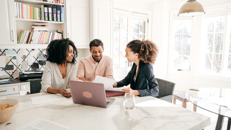 couple with financial advisor