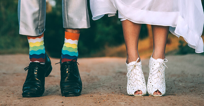 bride and groom showing their feet