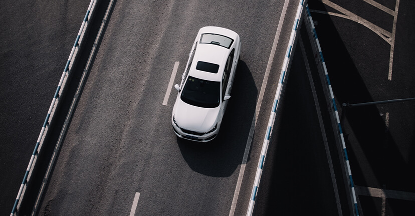 car on freeway overpass