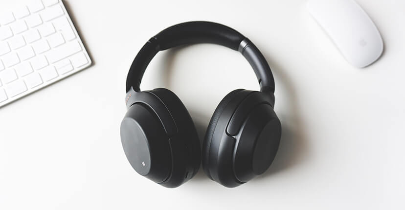 pair of headphones on desk