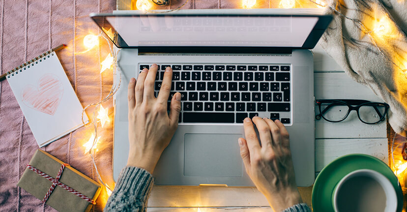 Overhead laptop with Christmas lights