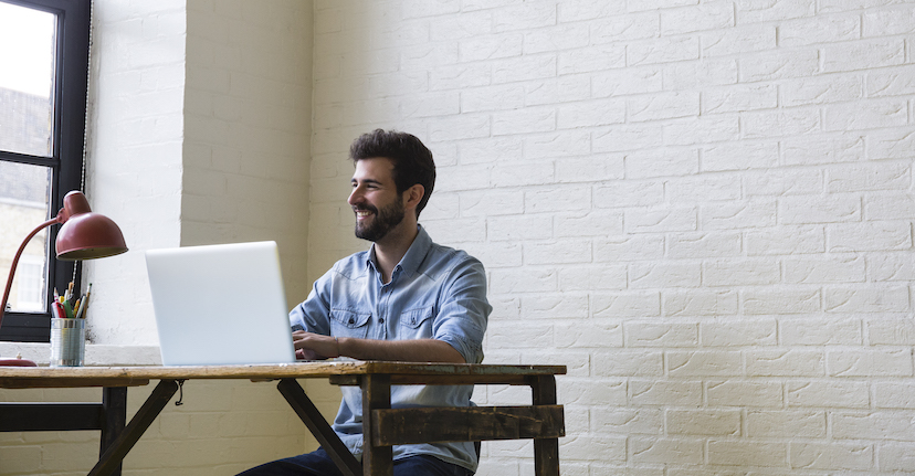 man sitting at desk