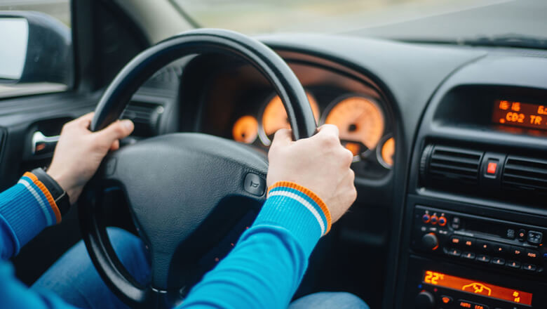 man driving car mobile