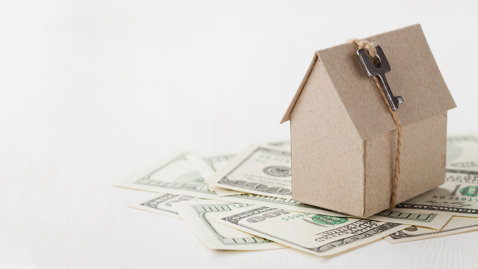 is it better to buy a house with cash or get a mortgage