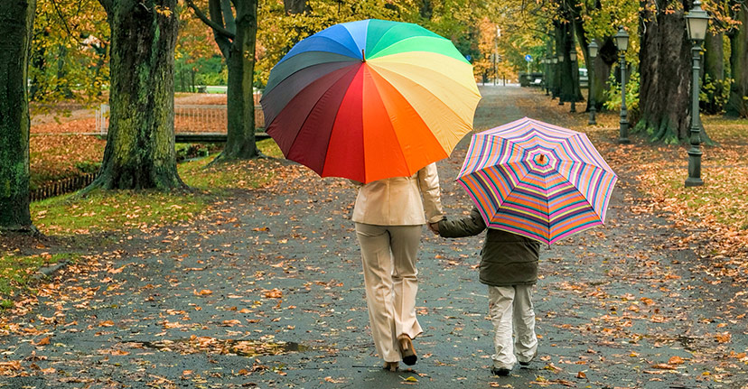 mother and child with umbrellas