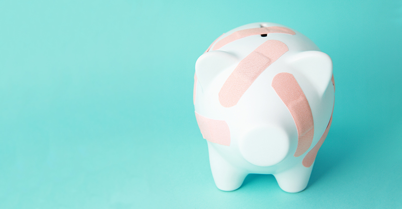 piggy bank with band-aids