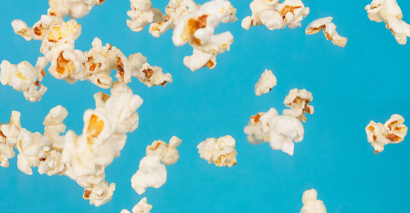 popcorn on blue background