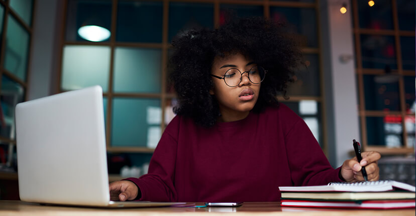 woman student on laptop