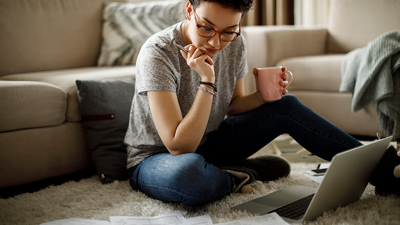 woman at home on laptop