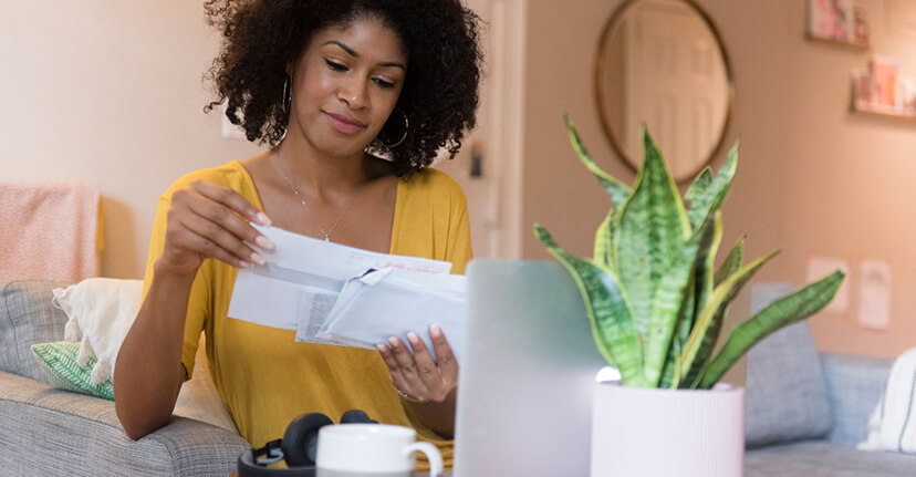 woman reading bill