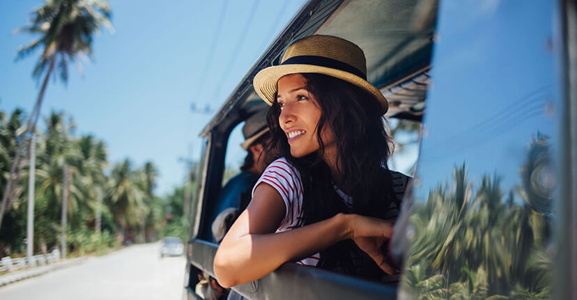 woman in car traveling