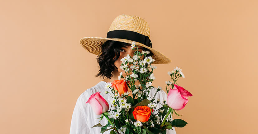 woman holding flowers